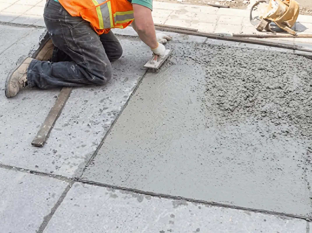 Professional repairing a concrete floor in Lakeland, FL